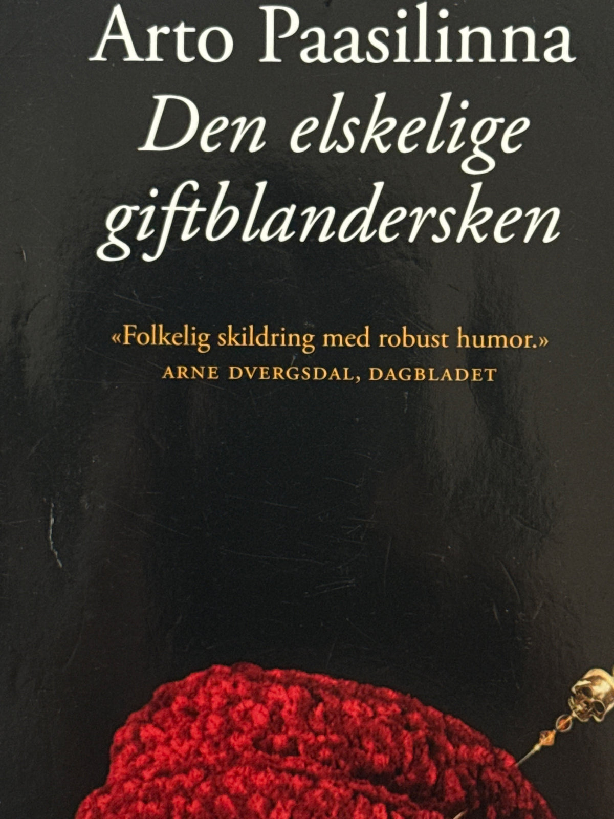 Forside av Den elskelige giftblandersken av Arto Paasilinna