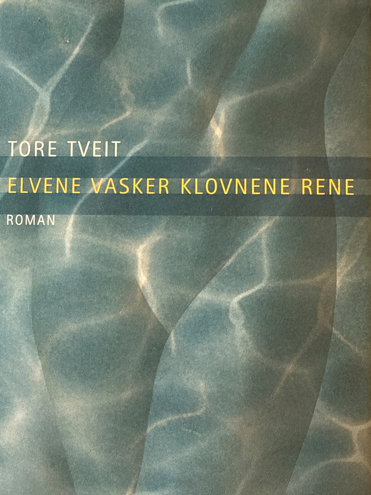 Forside av Elvene vasker klovnene rene av Tore Tveit