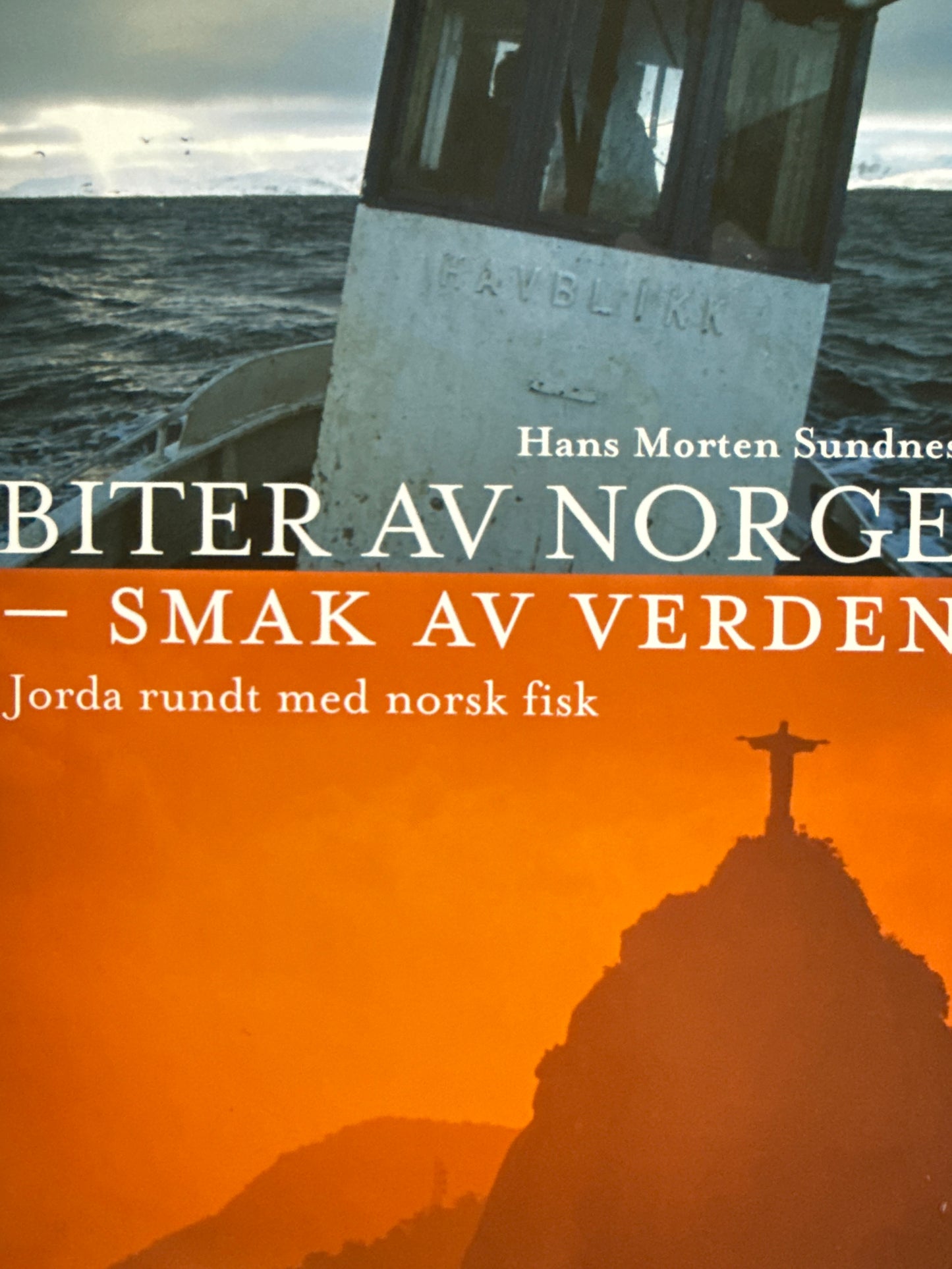 Biter av Norge - smak av verden : [jorda rundt med norsk fisk] - Innbundet