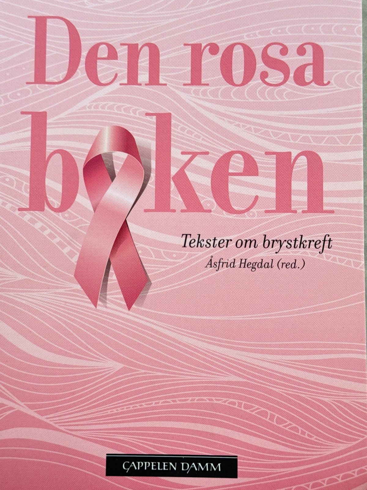 Forside av Den rosa boken av Åsfrid Hegdal 