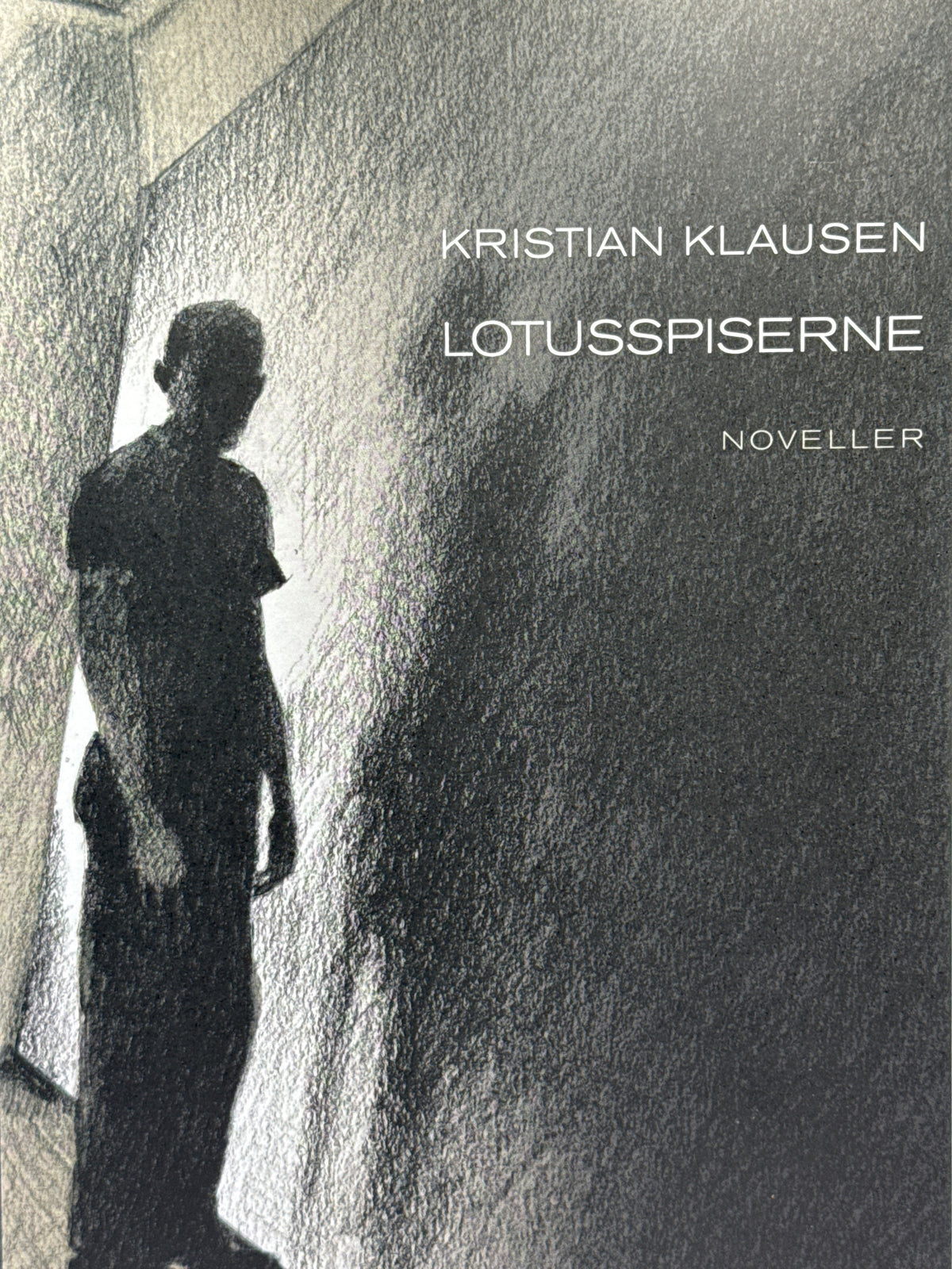 Forside av Lotusspiserne av Kristian Klausen 