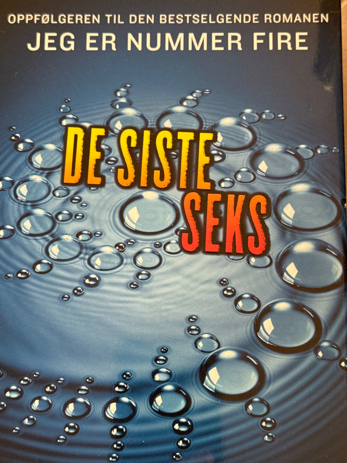 Forside av De siste seks av Pittacus Lore 
